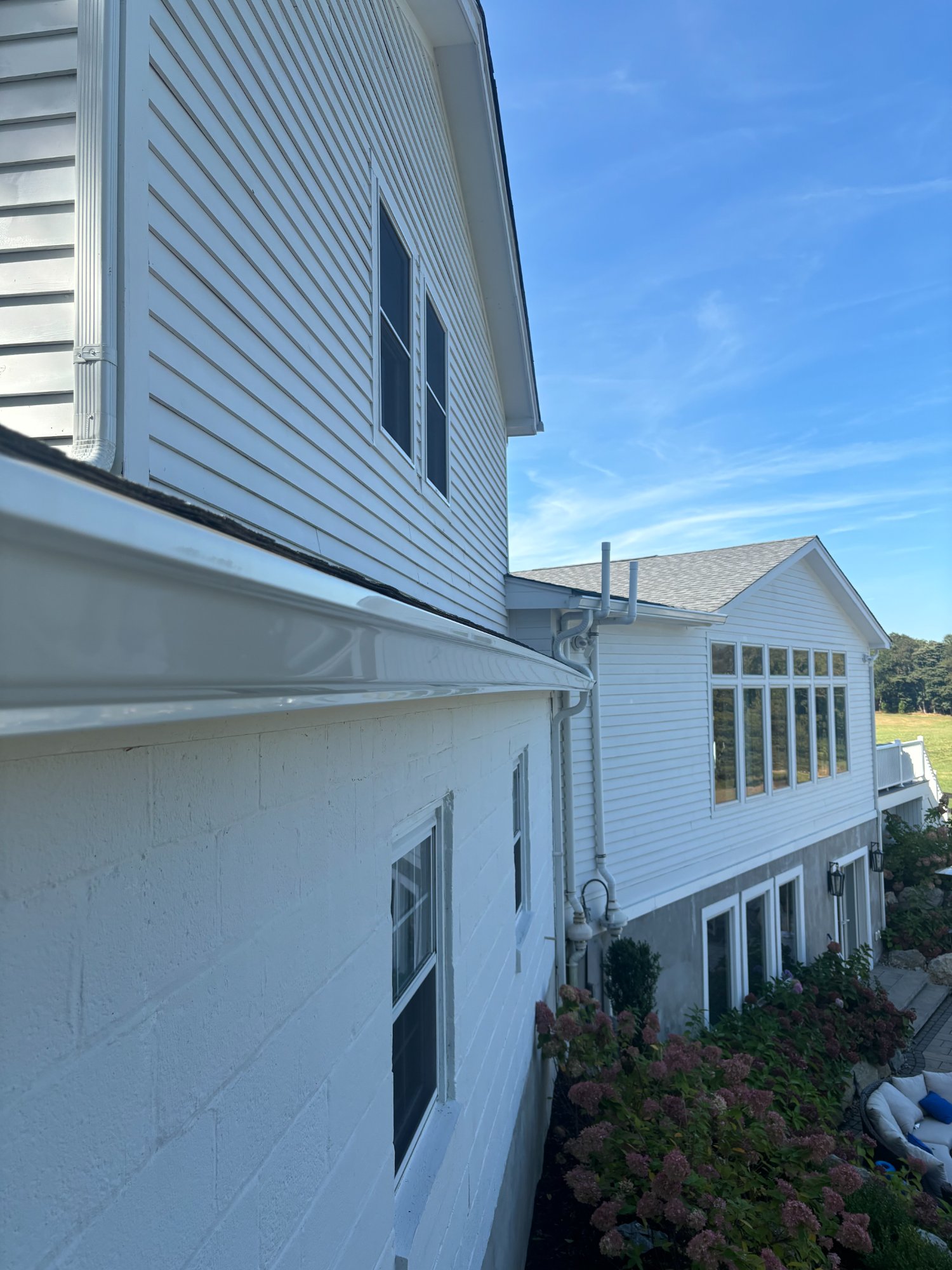 White seamless gutter install